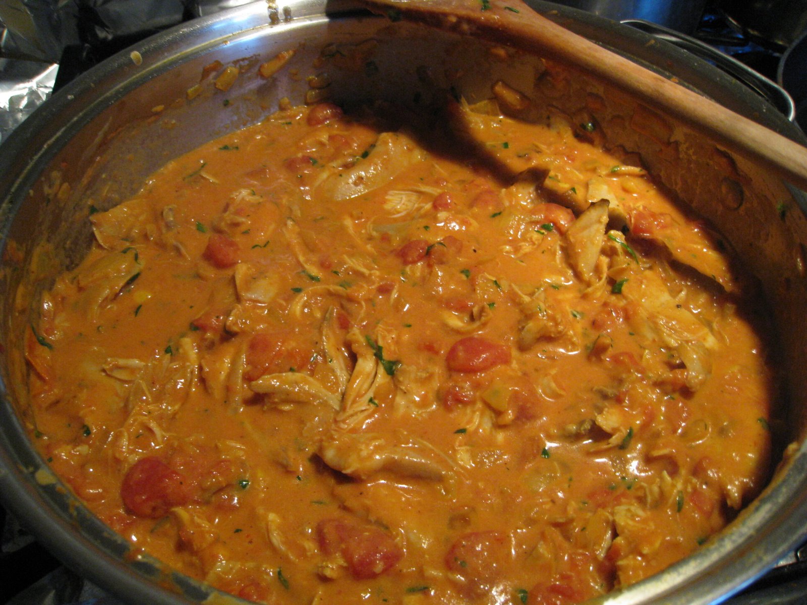 Butter Chicken (Creamy Tomato Curry, Restaurant-Style at Home) 2 Butter chicken simmering in a pot