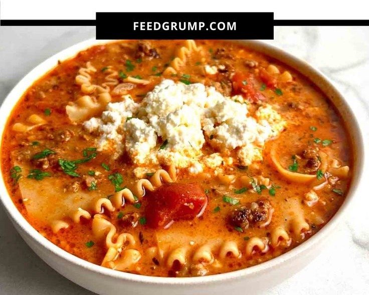 Easy lasagna soup with tender pasta, rich tomato broth and a melty ricotta dollop