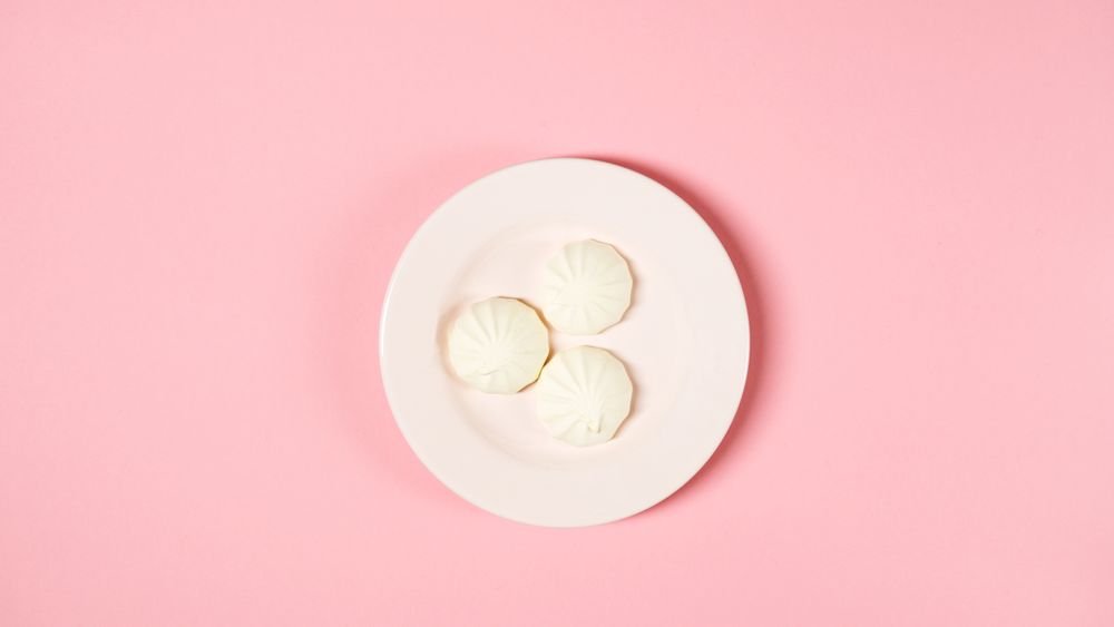 Spooky ghost meringue cookies close up