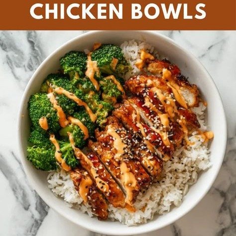 Healthy Sticky Chicken Bowls 2 Healthy sticky chicken bowl with sliced glazed chicken, rice, broccoli and creamy drizzle