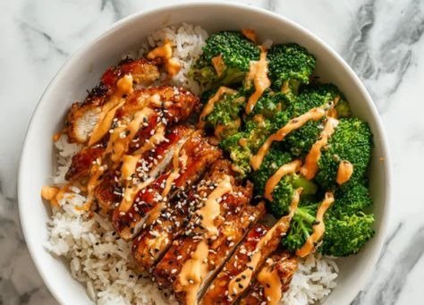 Healthy Sticky Chicken Bowls 3 Sticky chicken bowl with broccoli and sesame seeds, ready to serve