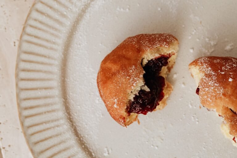 Vampire Bite Donuts oozing raspberry jam blood