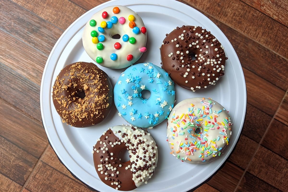 Air Fryer Halloween Donuts (The Spooky 20-Minute Party Recipe) 3 Air Fryer Halloween Donuts ingredients and decorating station