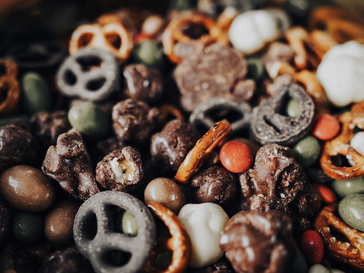 Monster Mix (The Spooky 15-Minute No-Bake Halloween Snack Mix) 2 Monster Mix ingredients in a bowl