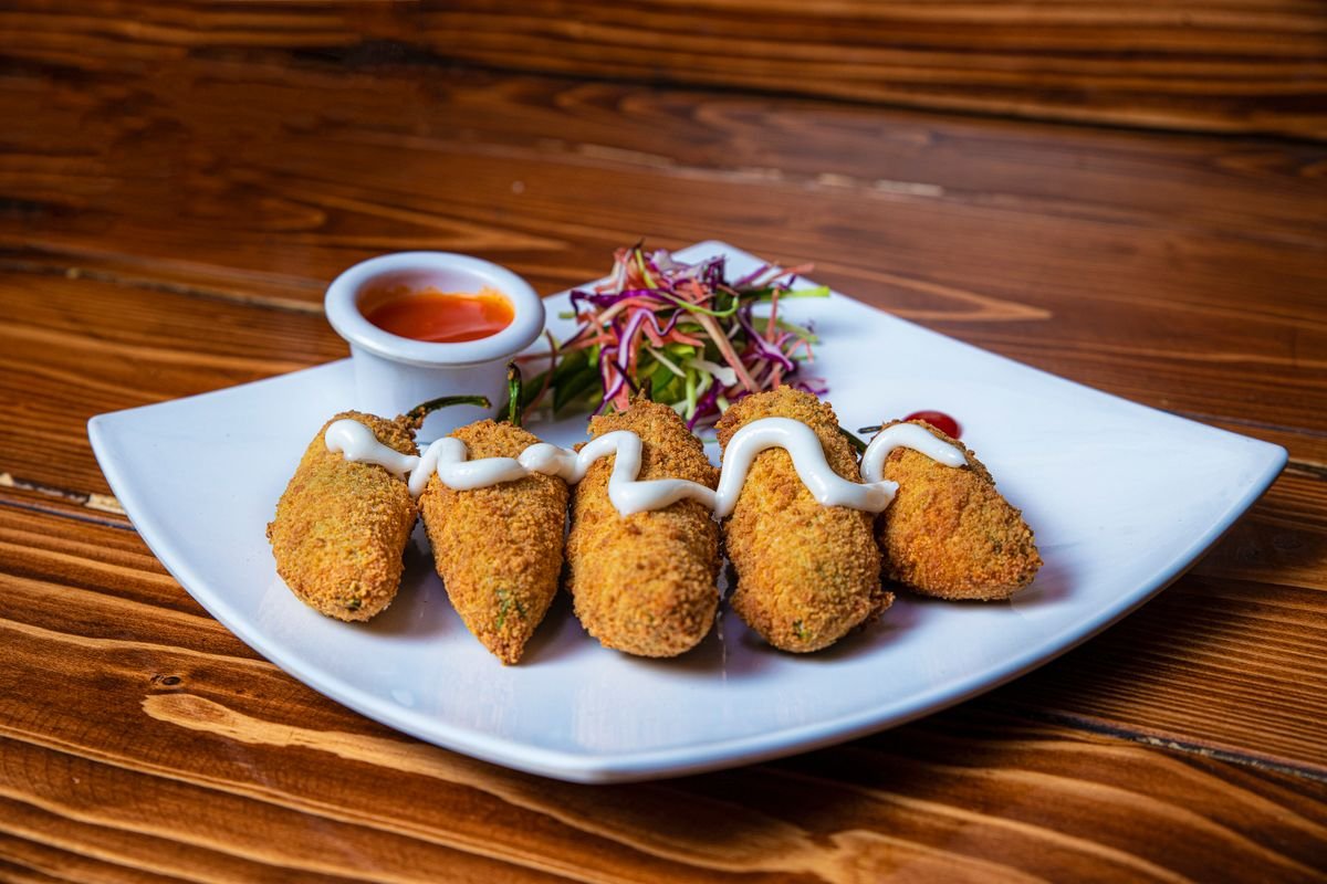 Mummy Jalapeño Poppers (The Spooky 25-Minute Halloween Party Appetizer) 3 Preparing mummy jalapeno poppers