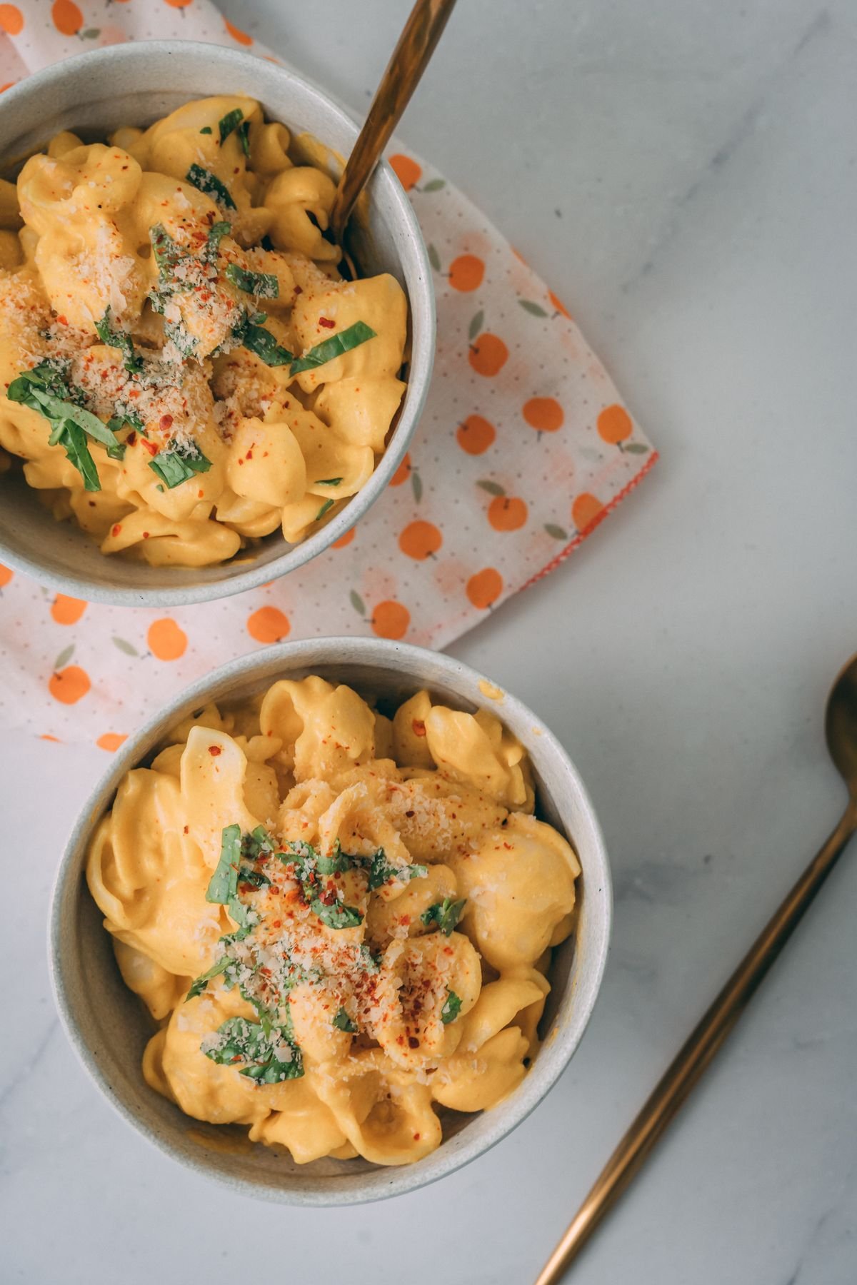 Whisking the silky pumpkin cheddar sauce