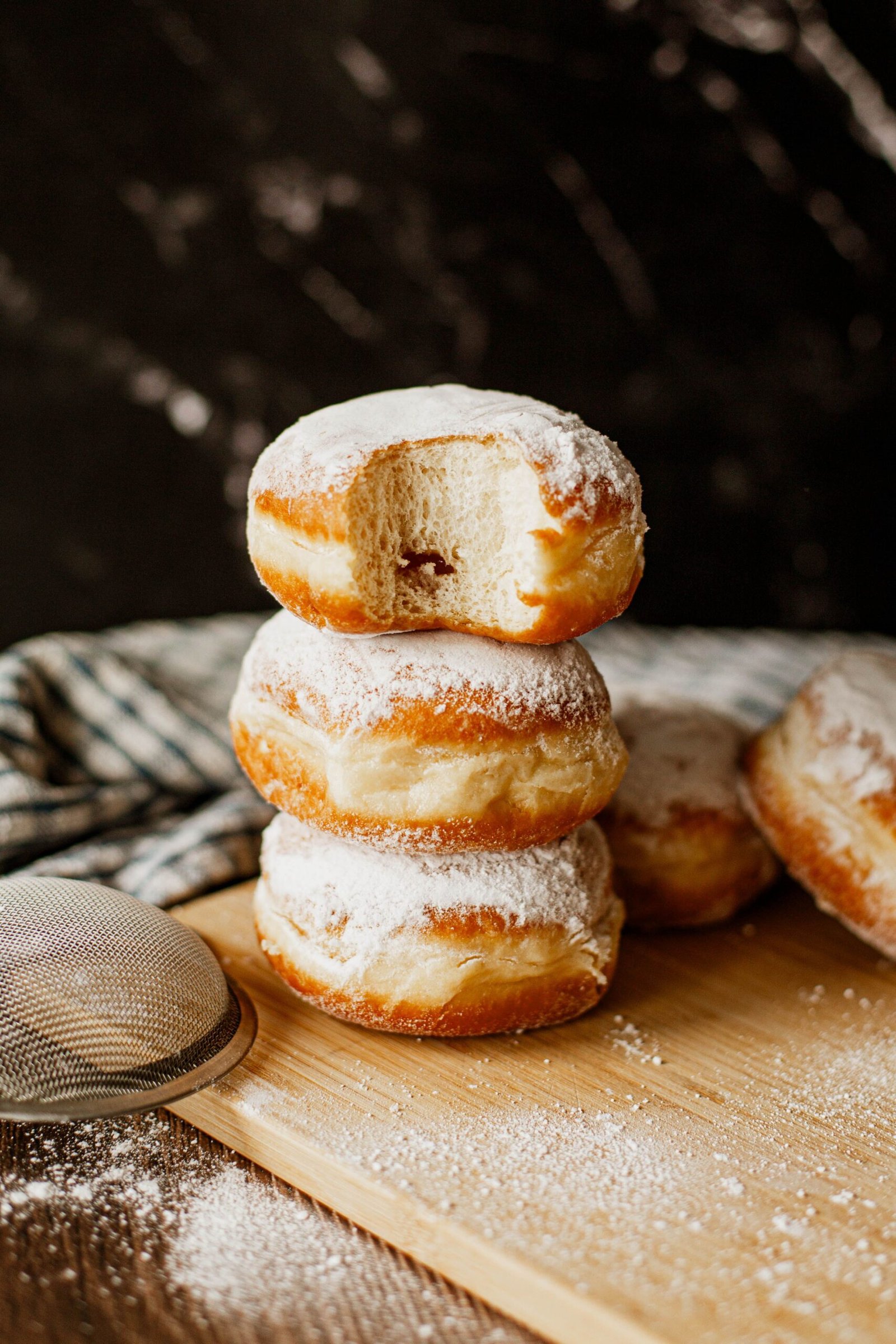 Frying vampire bite donuts until deep golden brown