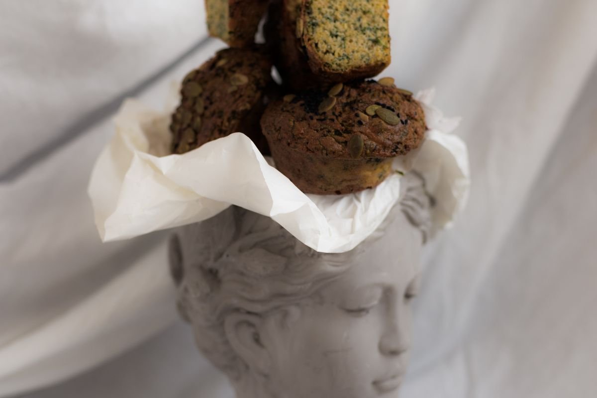 Pumpkin Zucchini Muffins (The Moist 35-Minute Fall Muffins) 4 Pumpkin zucchini muffins topped with pumpkin seeds