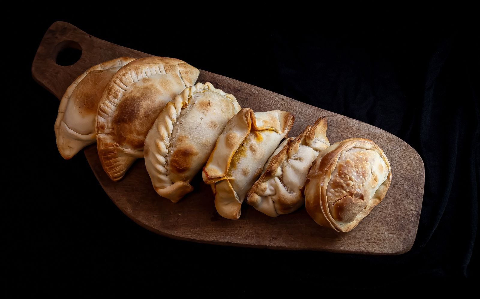 Mummy Meat Pies (The Spooky 45-Minute Halloween Hand Pies) 4 Wrapping mummy meat pies with pastry strips