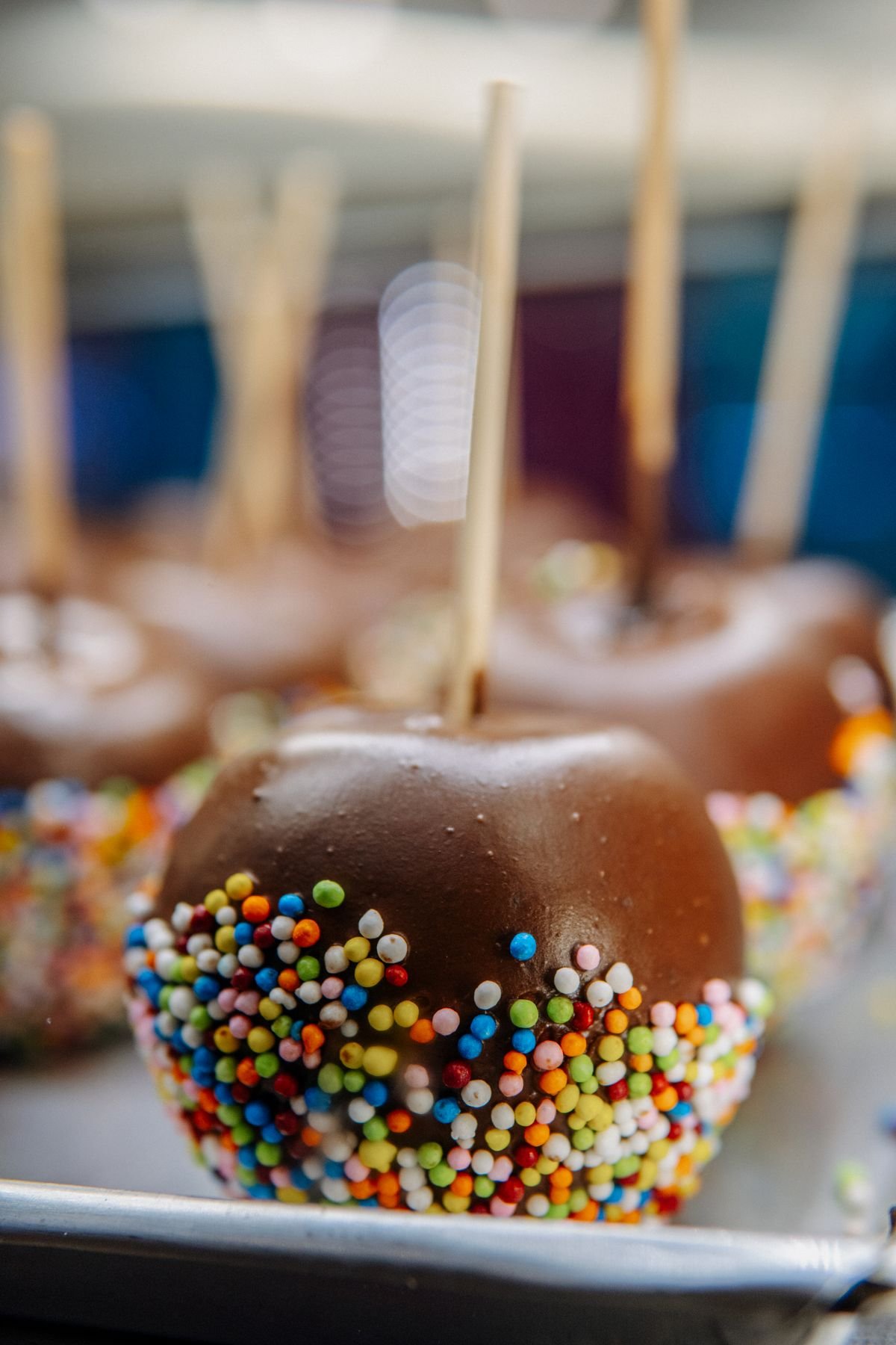 Spooky Caramel Apples (The 30-Minute Halloween Treat) 5 Decorating caramel apples with chocolate spiderweb