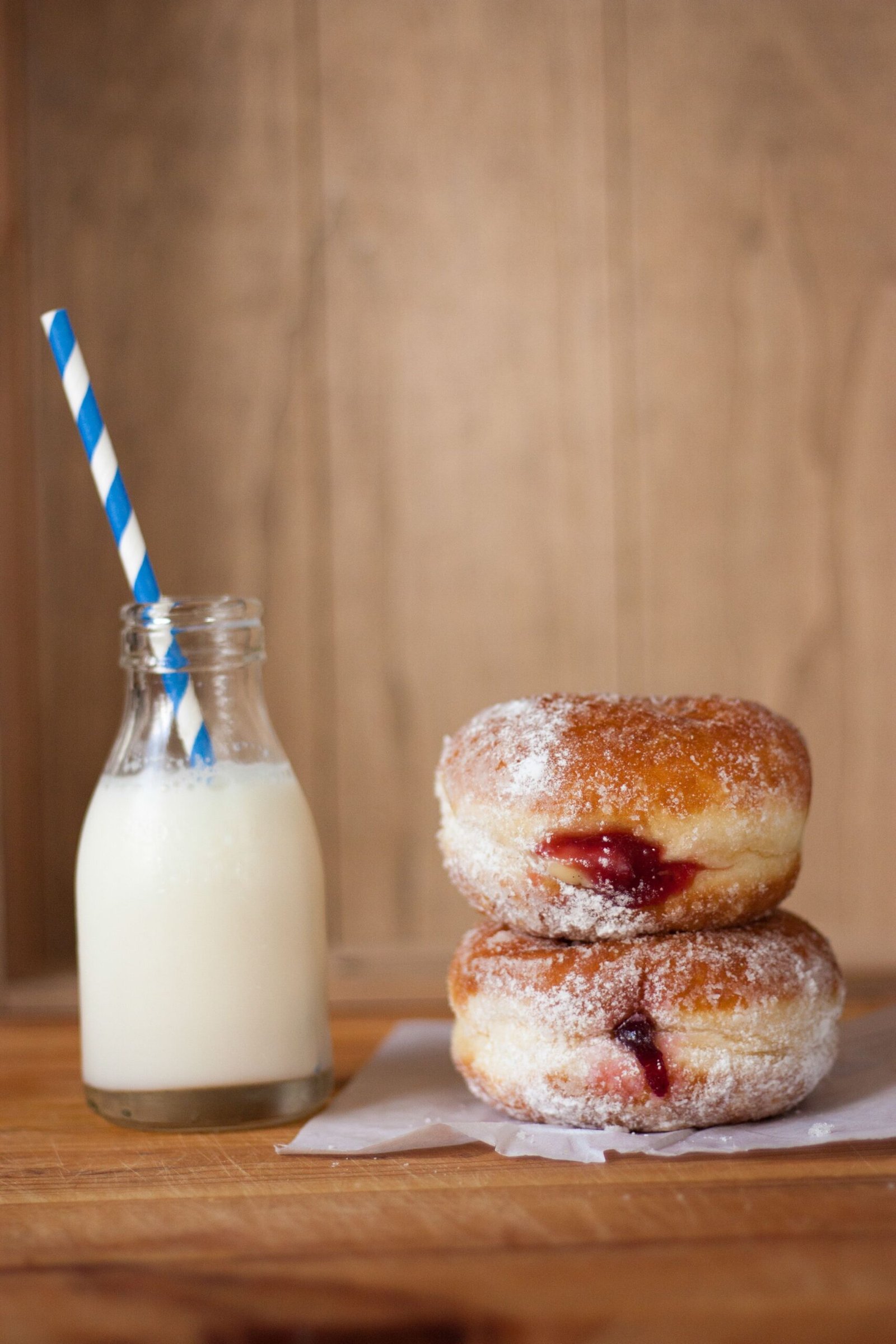 Vampire bite donuts with plastic fangs ready to serve
