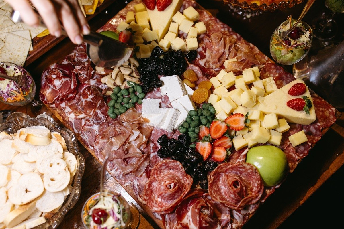 Spooky Halloween Charcuterie Board (The 25-Minute No-Bake Party Board) 6 Overhead view of the finished spooky Halloween charcuterie board with crackers and breadsticks