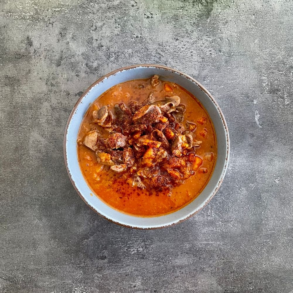 Ghoul-ash (The Spooky 45-Minute Halloween Beef Goulash) 6 Plated beef goulash chunks in red paprika sauce with tomatoes and parsley