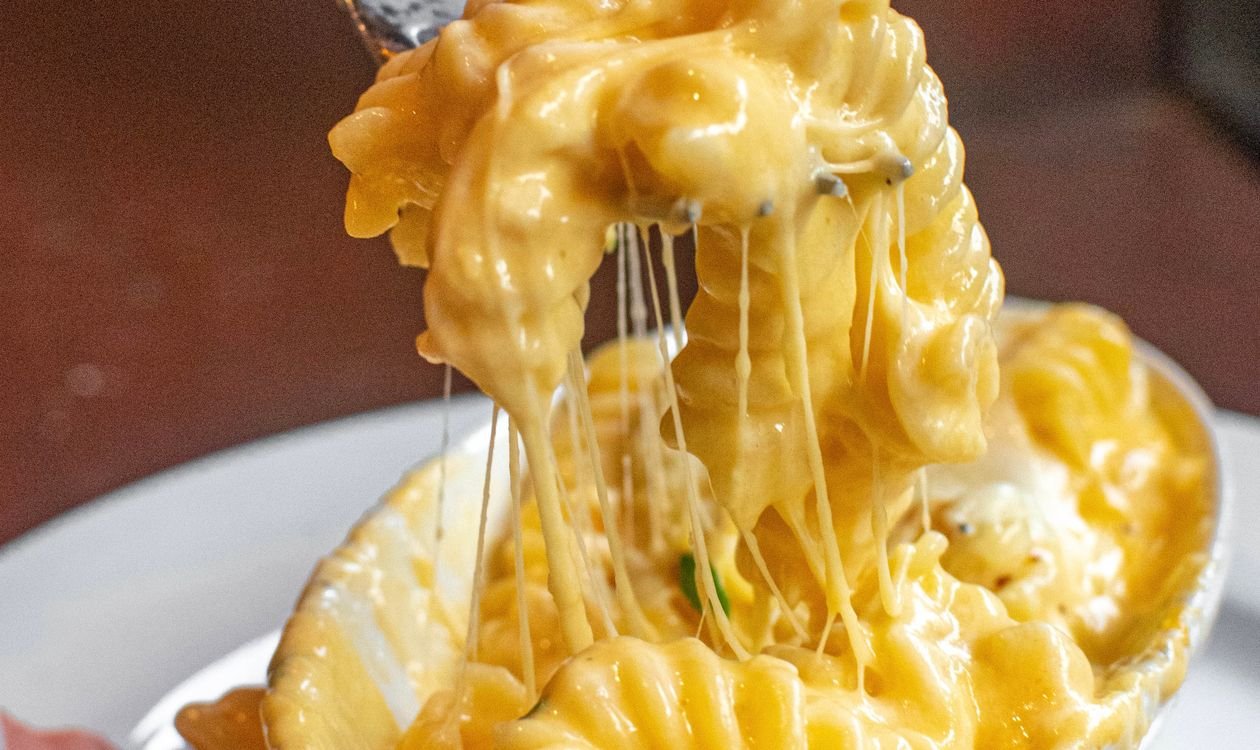 The Creamiest Baked Mac and Cheese (45-Minute Comfort Classic) 3 Cheesy baked mac and cheese pull