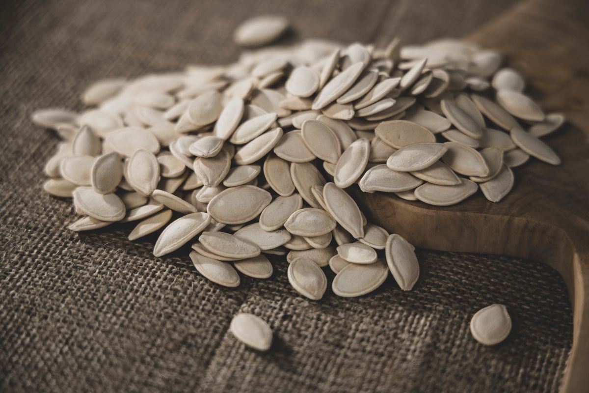 Air Fryer Roasted Pumpkin Seeds (3 Flavors — The Crunchy 20-Minute Halloween Snack) 4 Pile of seasoned pumpkin seeds
