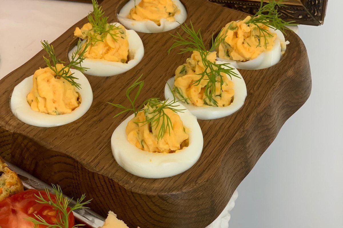 Spider Deviled Eggs (The Spooky 25-Minute Halloween Party Appetizer) 3 Spider deviled eggs arranged on a platter