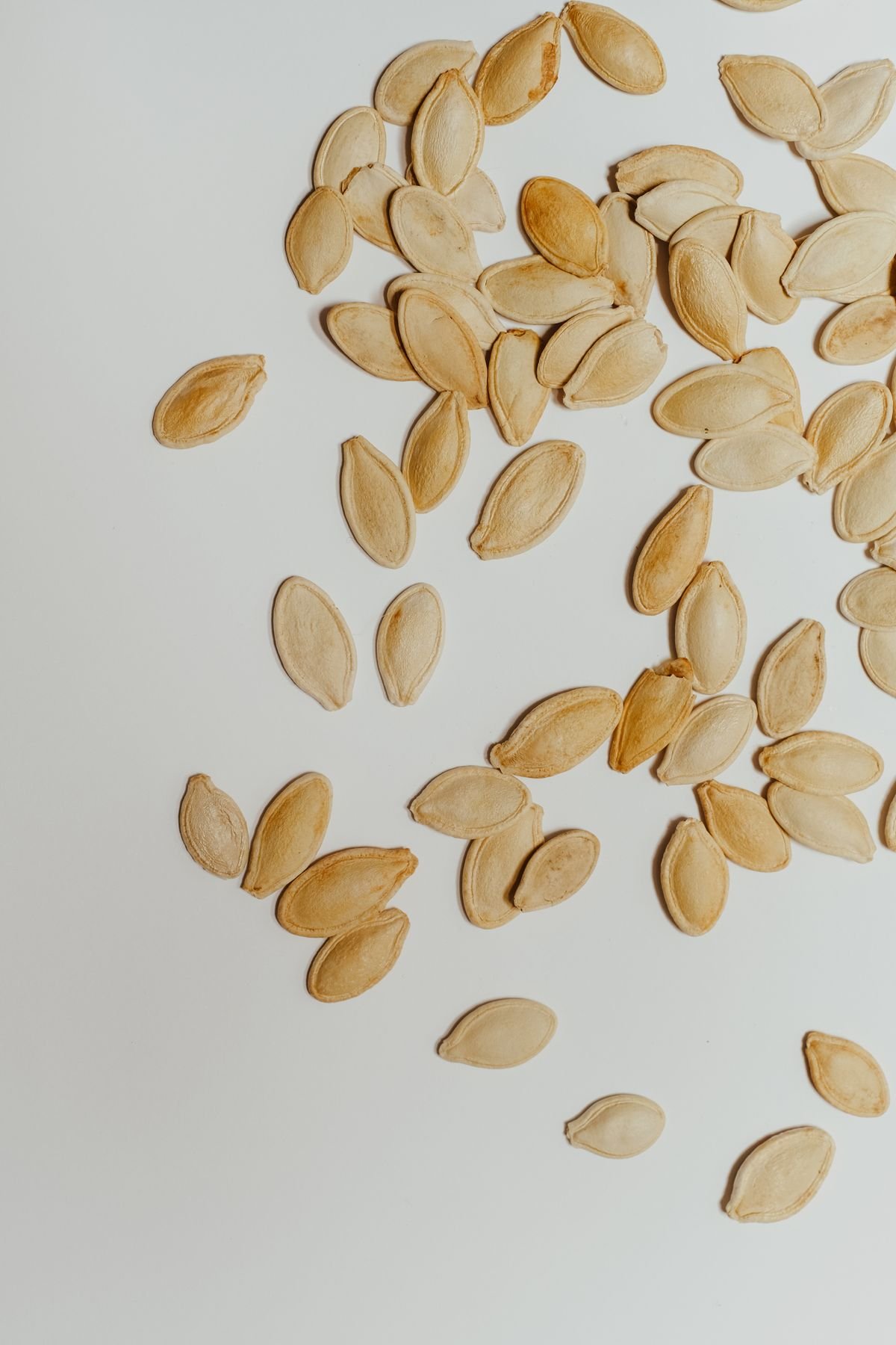 Air Fryer Roasted Pumpkin Seeds (3 Flavors — The Crunchy 20-Minute Halloween Snack) 5 Close-up of toasted pumpkin seeds