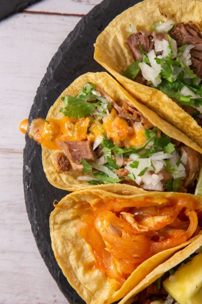 Spiderweb Tacos (The Spooky 20-Minute Halloween Taco Night) 3 Three beef tacos with melted cheese, tomato and shredded lettuce served with salsa and sour cream