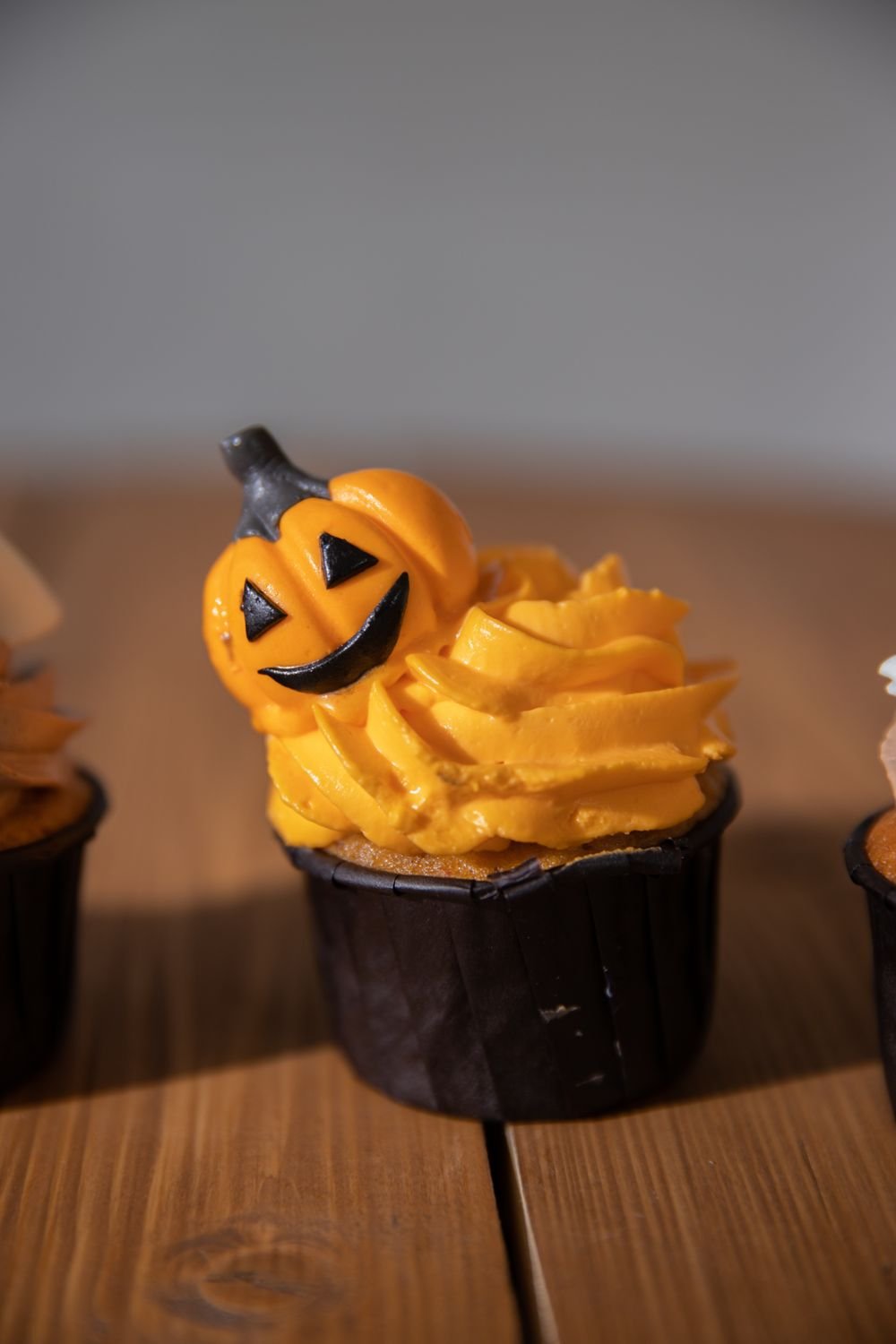 10 Best Pumpkin Recipes You Must Try 4 Pumpkin patch cupcakes with orange frosting and jack-o-lantern toppers