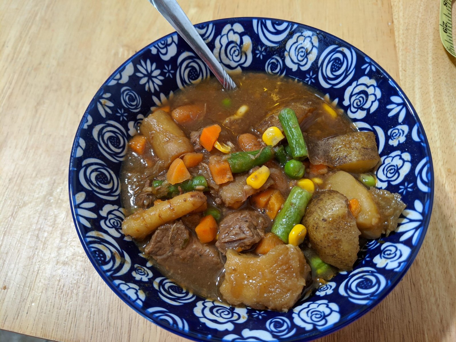 Slow Cooker Beef Stew (Tender Beef, Potatoes, and Carrots) 2 Bowl of slow cooker beef stew with tender beef, potatoes, carrots, green beans, corn, and peas