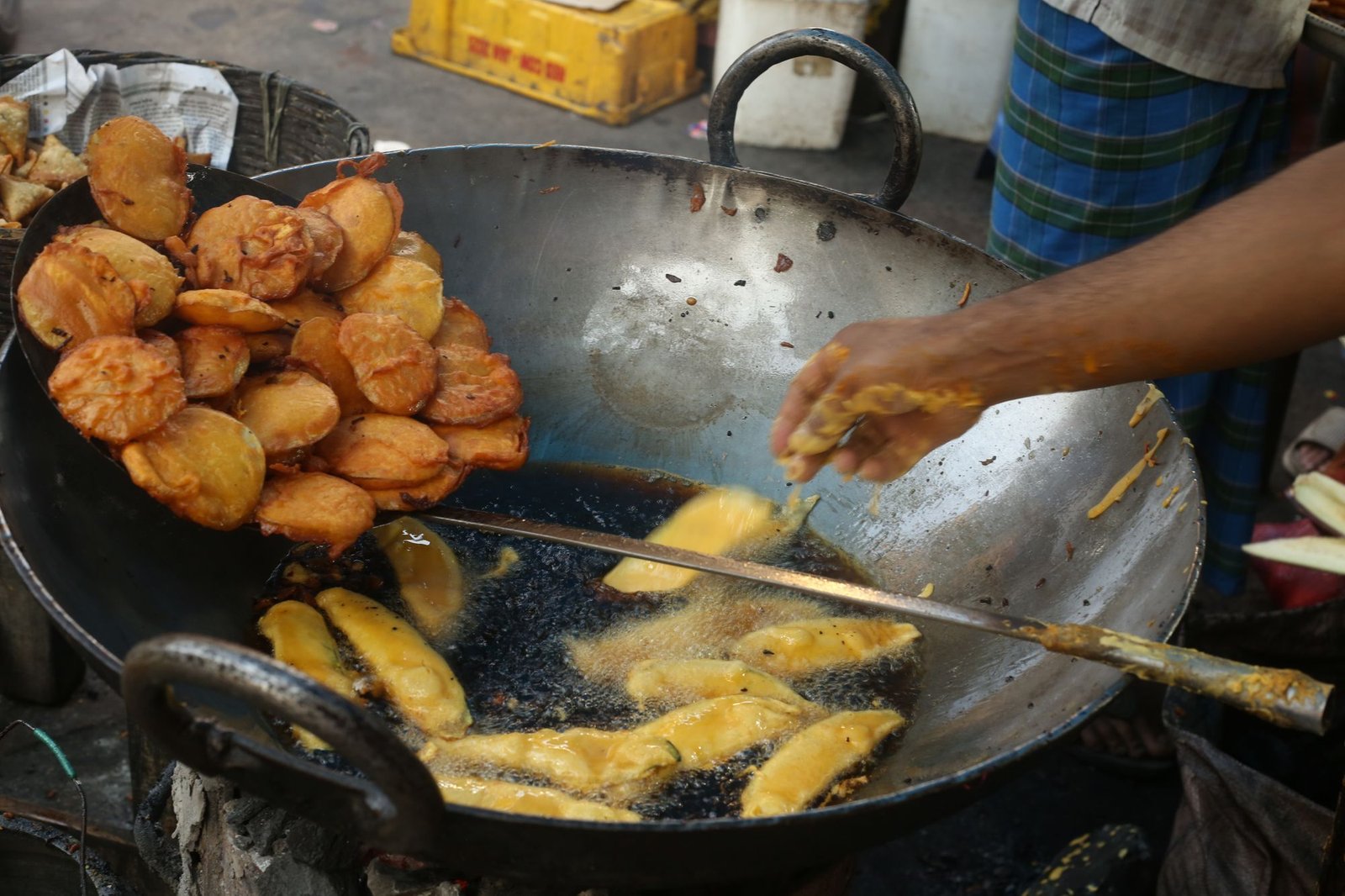 Air Fryer Pumpkin Fritters (The Crispy 25-Minute Halloween Party Snack) 5 Golden pumpkin fritters frying to a crisp finish